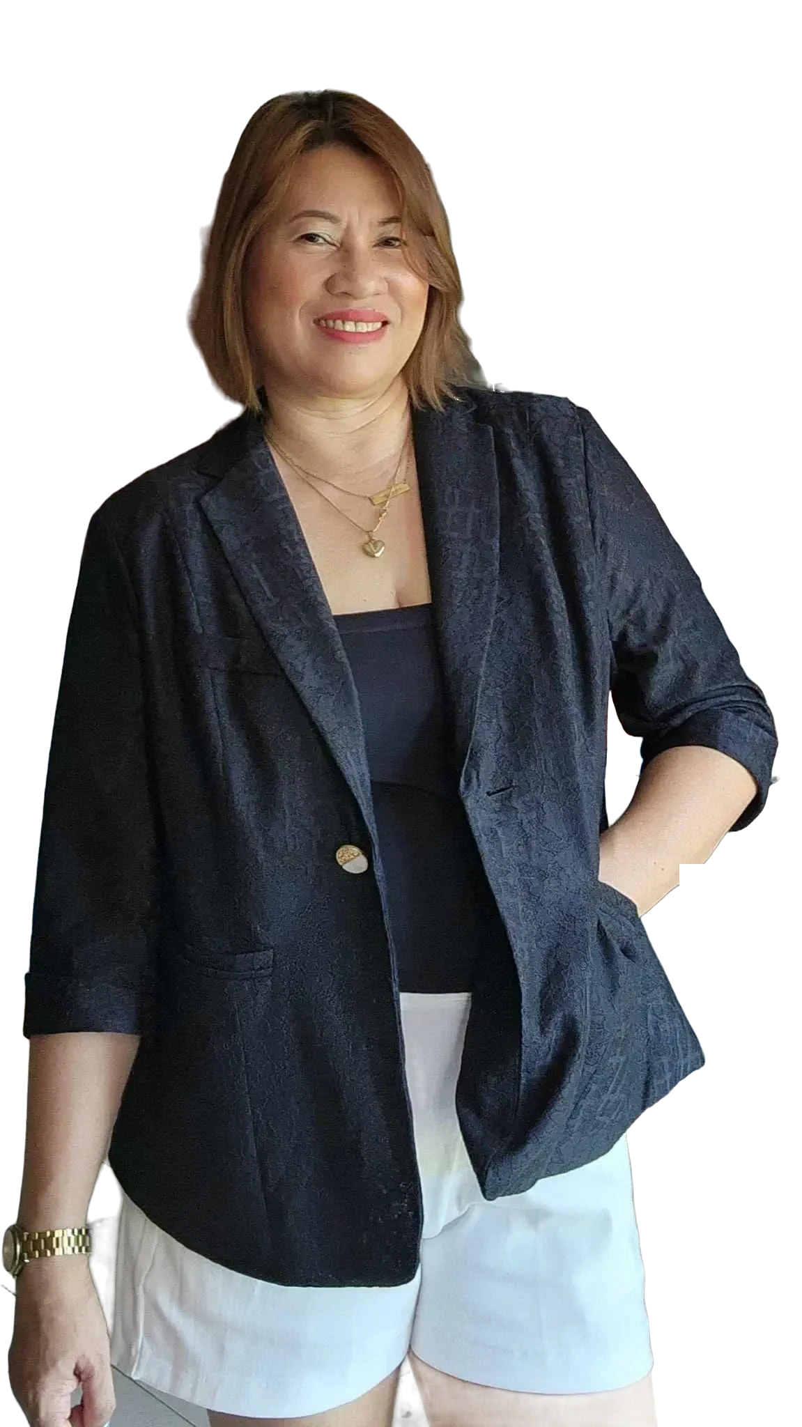Coach A, Arlene Villegas Alfonso, smiling in a dark blazer